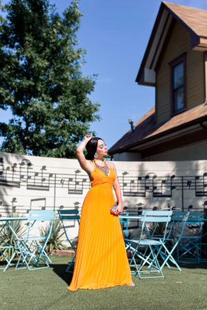 orange pleated dress