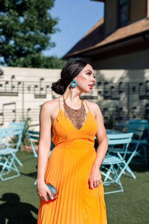 orange pleated dress