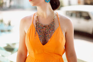 orange pleated dress